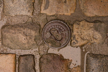 Wet stone road. Texture.