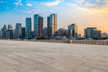 Urban skyscrapers with empty square floor tiles