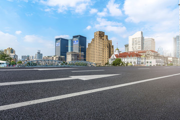 Fototapeta na wymiar Prospects for expressway, asphalt pavement, city building commercial building, office building