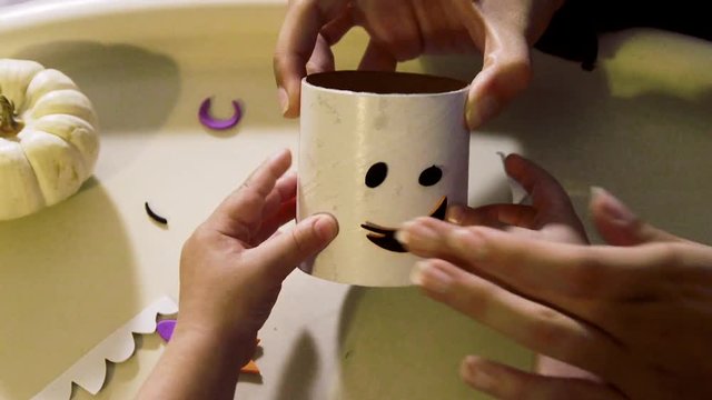 Video Of A Young Toddler Boy Making Spooky Halloween Crafts With His Mom At Their Living Room Table