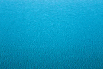 Sea texture of the water surface with slight ripples. Bird's eye view.