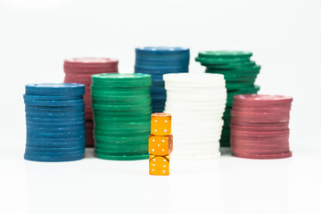Red dice with banknotes as background.