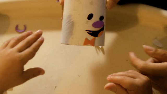 Video Of A Young Toddler Boy Making Spooky Halloween Crafts With His Mom At Their Living Room Table