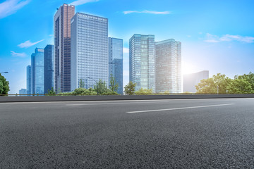 Obraz premium Air highway asphalt road and office building of commercial building in modern city