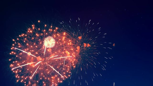 Bright fireworks display in the sky.