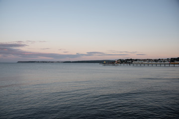 Calm Sea and Pier at Sunset 