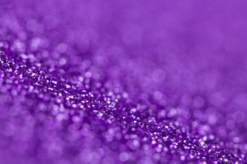 Purple glitter texture close up macro. Abstract sparkle background.