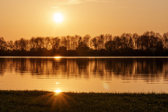 Golden sunset over Feringasee in munich - lake.