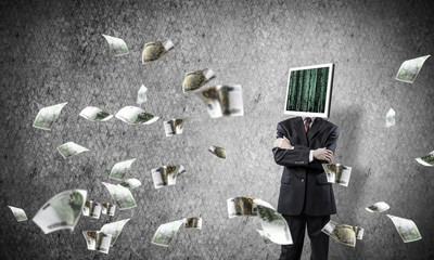 Businessman with monitor instead of head.