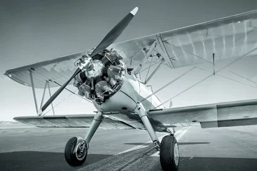 Fototapeten sports plane on a runway © frank peters