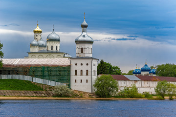 Fototapeta na wymiar The St. George's (Yuriev) Orthodox Male Monastery on the banks of The Volkhov River. Veliky Novgorod, Russia.