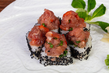 Roll with raw beef