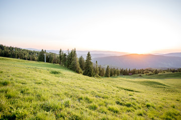 Landscape view on the beautiful Carpathian mountains on the High Top near the Slavske village during the sunset in Ukraine