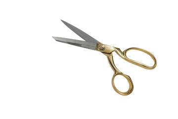 Scissors with golden handle on isolated white background