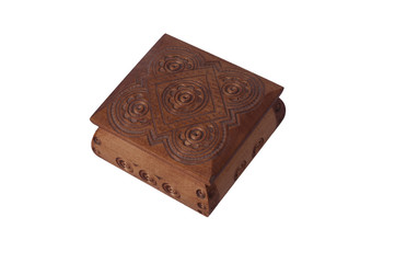 Old wooden casket with graved pattern isolated