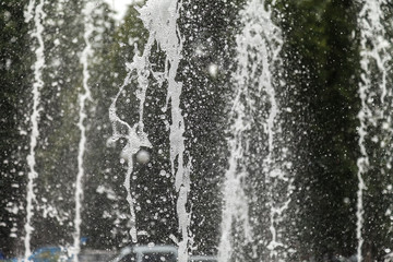 Naklejka na ściany i meble Splashing water from a fountain