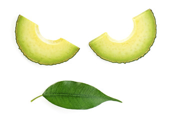 Avocado slices with leaf on white background. Food concept.