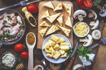 different cheeses and ingredients for cooking