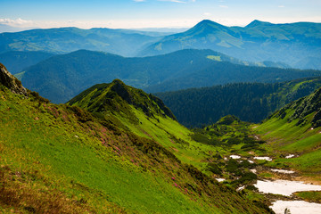 Steep green mountain slopes