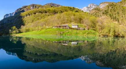 Reflection at sunset in the Mis Valley, Dolomites, Italy © kovgabor79