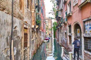 Typical small canal in Venice in Italy