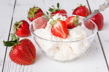 cottage cheese with strawberry sauce and fresh berries