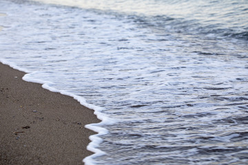 Wave on Clear Sand Beach