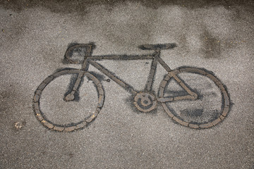 Naklejka na ściany i meble Bicycle sign on road