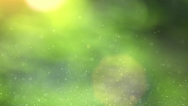 Slow motion of the abstract air bubbles on sunny yellow green sunny nature bokeh background.