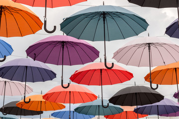 Fototapeta na wymiar Multicolored umbrellas, colorful background