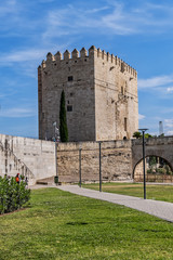 Fototapeta na wymiar View of Calahorra Tower. Tower of Calahorra - fortress of Islamic origin conceived as an entrance and protection of the Roman Bridge of Cordoba across Guadalquivir River. Cordoba, Andalusia, Spain.