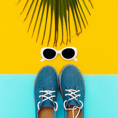 Fashion summer accessories. Flat lay look. Jeans shoes and sunglasses