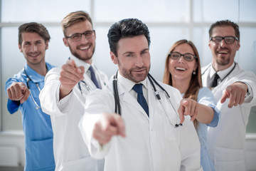 Fototapeta premium team of doctors and nurses, pointing at you