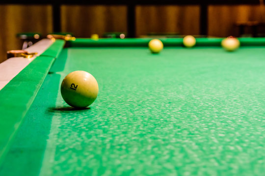 Balls on the green cloth. Russian billiard
