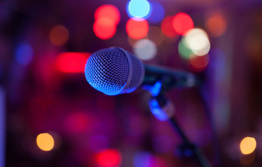 Fototapeta na wymiar Image of a microphone in the concert hall. 