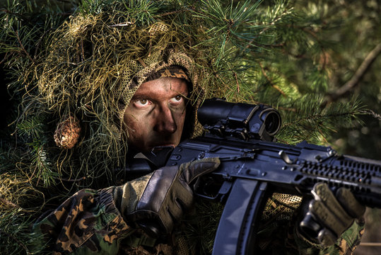 Portrait of a camouflaged soldier