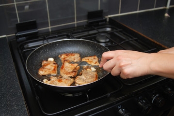Pork Meat Steake Fried Black Pan Hand Hold Fok Cooking Kitchen Background