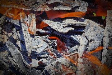 burning coals in the grill