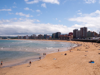 Summer holidays in Gij&oacute;n (Asturias, north of Spain). San Lorenzo beach view.