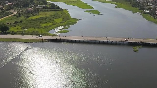 People Walking On Grand Bassam Bridge