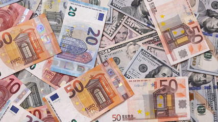 Background with money. Euro and dollar