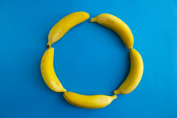 Pack of bananas on blue background