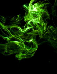 Green smoke on black background