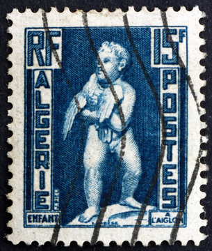 Postage stamp Algeria 1952 Child with Eagle, Statue