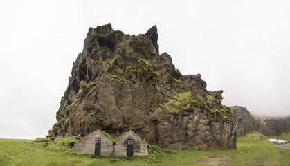 Drangurinn Rock with traditional Icelandic Houses, Panoramic