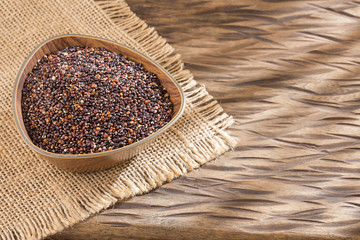 Organic raw black quinoa seeds - Chenopodium quinoa. Top view