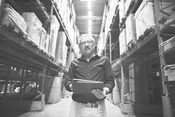 Caucasian man checking stock inventory