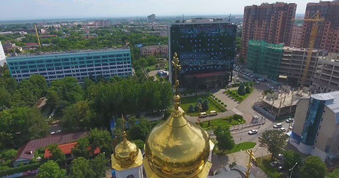 flight over the golden domes of the church. Drone 4k