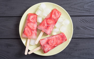 Homemade popsicles with strawberry