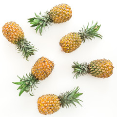 Pineapples isolated on white background. Flat lay, top view. Food concept.